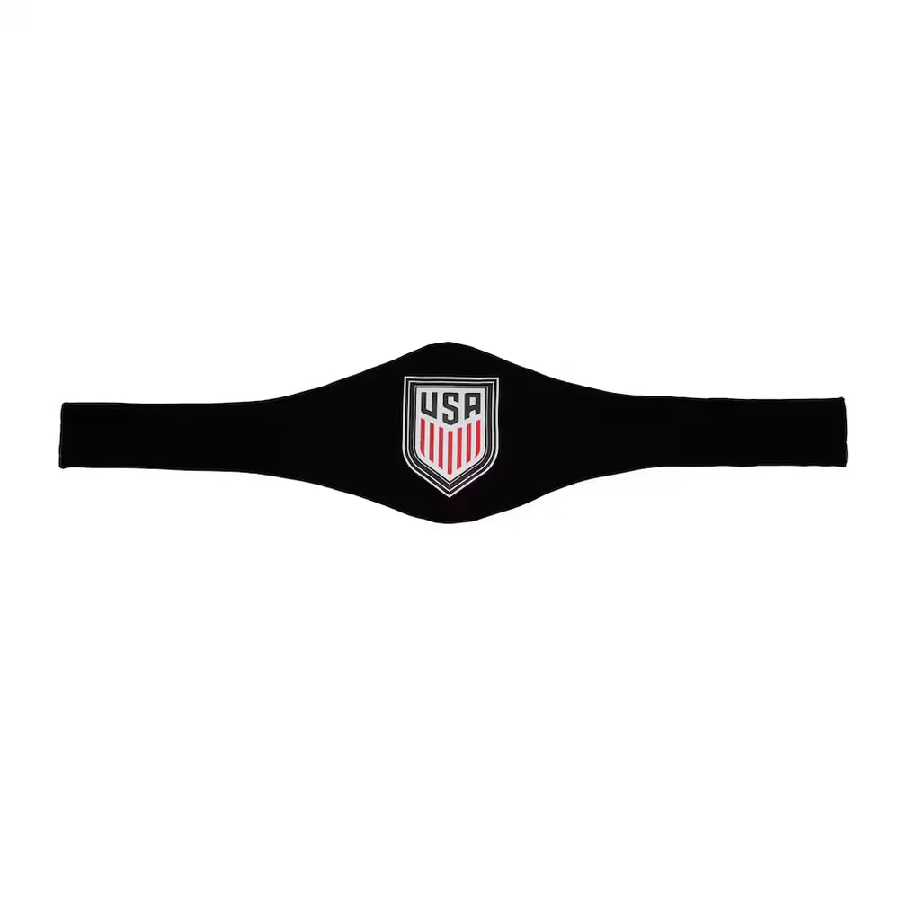 A black athletic headband featuring a central USA shield logo with red and white vertical stripes and a silver border, displayed against a solid white background.