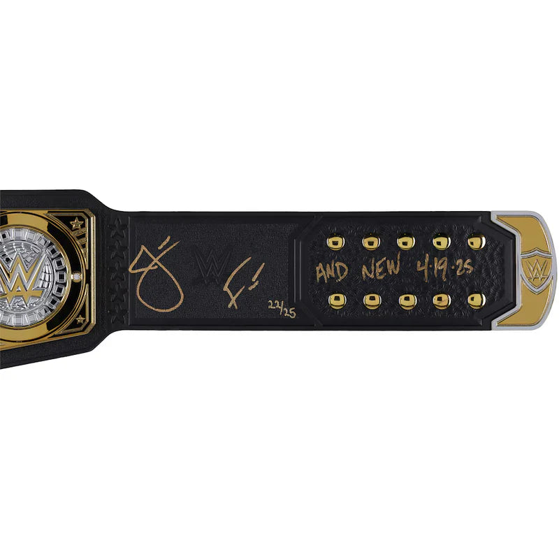WWE championship belt with gold and black design on a white background