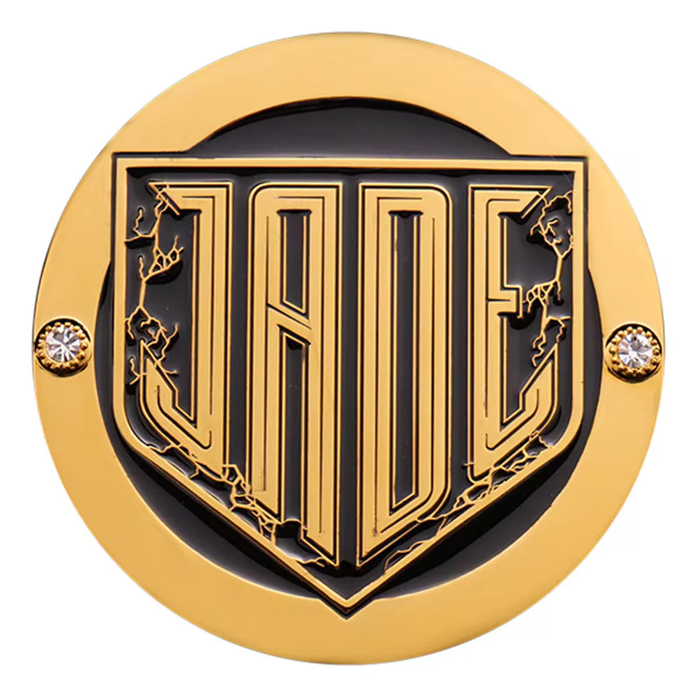 Decorative emblem with 'JADE' in the center, surrounded by gold and black design elements on a white background. Jade Cargill 16MM Replica Side Plate Box Set