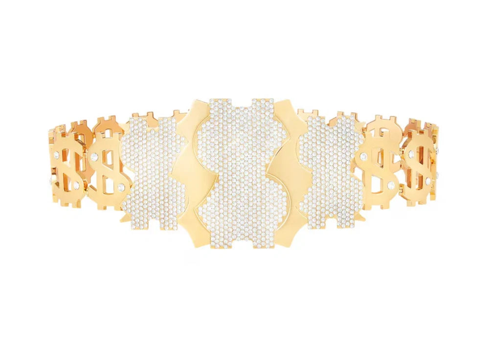 A gold-tone cuff bracelet featuring a central Bitcoin symbol paved with clear stones, flanked by two Bitcoin dollar-sign motifs on each side, set against a plain white background.