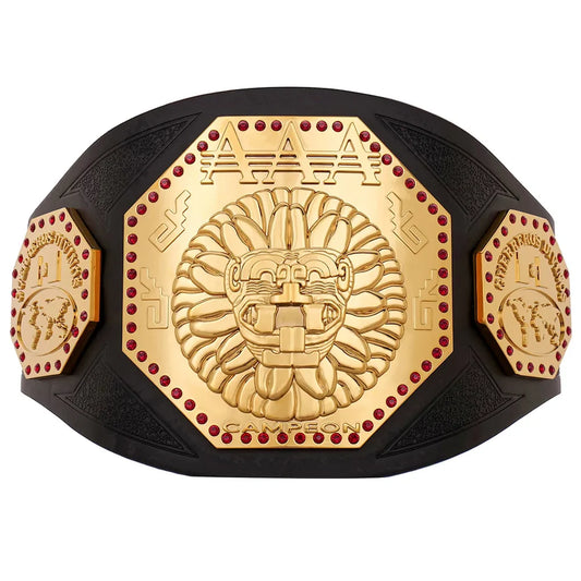 A championship-style belt with a large central gold-toned octagonal plate featuring a lion face motif and the text 'AAA', flanked by two smaller gold-toned side plates, all mounted on a black curved base. The belt is photographed on a plain white background.