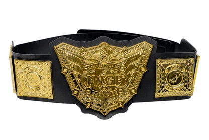 A black and gold championship belt featuring a large central shield-shaped plate with 'TWP' and 'Wrestling Champions' text, flanked by two square gold plates on a white background.