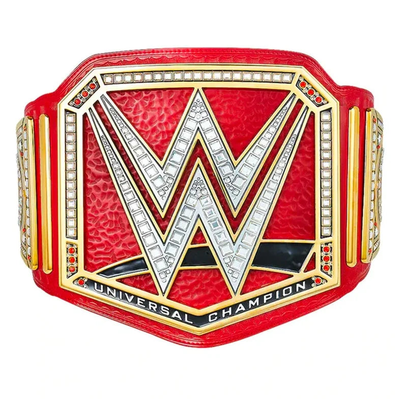 WWE Universal Champion belt featuring a red textured leather strap, a large silver 'W' logo outlined in gold, rhinestone accents, and 'UNIVERSAL CHAMPION' text on a white background.