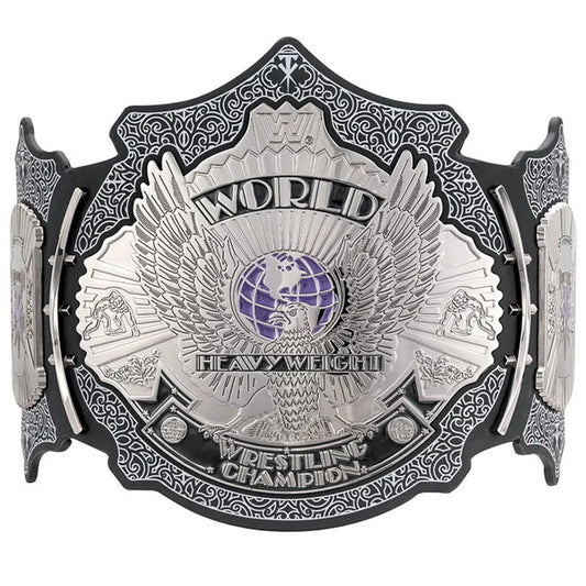 A silver and black WWE World Heavyweight Wrestling Champion belt with a purple globe emblem in the center, shown against a plain white background.