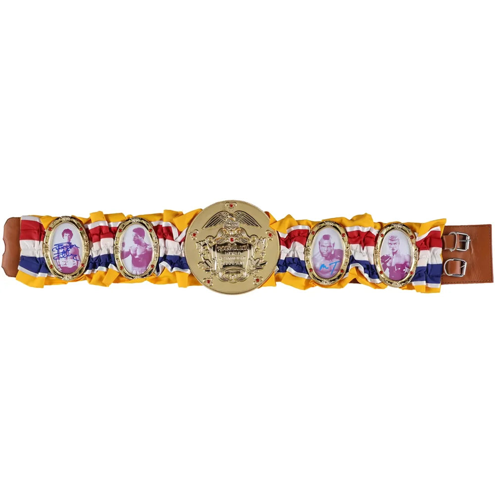 A traditional Thai royal belt (Sampao) featuring a gold-colored central plaque with a royal crest, flanked by four oval plaques with portraits of royal children, all mounted on a yellow, red, and white striped fabric strap with a brown leather end.