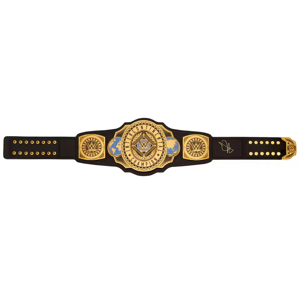 A black and gold championship-style belt with ornate central plaque, decorative side plates, and a black strap with gold studs, shown on a plain white background.