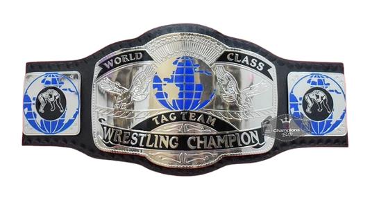 A wrestling championship belt featuring a large central silver plate with blue and black details, flanked by two side plates, on a plain white background.