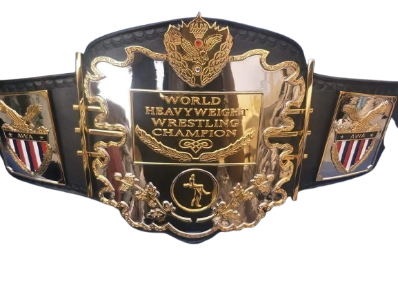 A championship wrestling belt with a large polished gold central plate engraved 'WORLD HEAVYWEIGHT WRESTLING CHAMPION' and ornate gold detailing, mounted on a black strap with side panels featuring eagle and shield emblems.