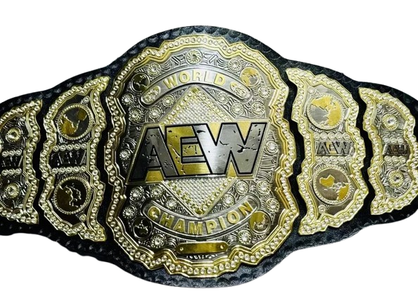 An AEW World Champion belt featuring a large central plate with 'AEW' in bold letters, flanked by ornate gold and silver decorative plates on a black background.