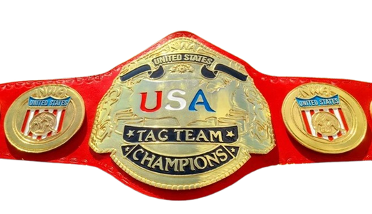 A red and gold USA Tag Team Champions belt with a large central gold plate and two matching side plates on a white background.