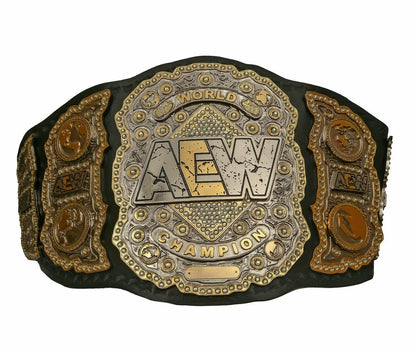 Wrestling championship belt with a prominent logo on a black background