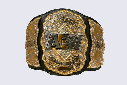 An AEW World Champion belt with ornate gold and silver plates, black leather-like sides, and rhinestone details, centered on a light gray background.