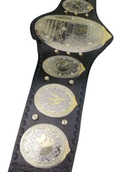 A black leather championship belt with multiple large gold and silver metallic plates, shown on a plain white background.