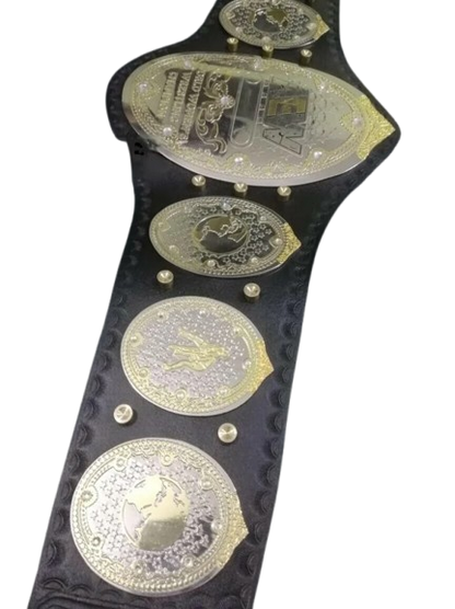 A black leather championship belt with multiple large gold and silver metallic plates, shown on a plain white background.