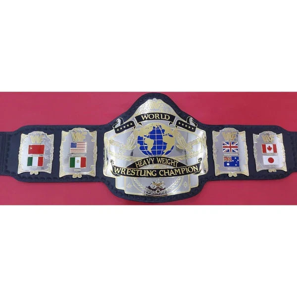 World Heavyweight Wrestling Championship belt with flags on a pink background