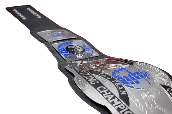 A black and silver championship wrestling belt with blue globe graphics, shown diagonally on a white background.