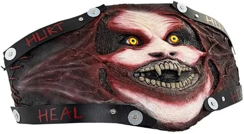 Helmet with a graphic design of a face with yellow eyes and text 'HURT' and 'HEAL'.