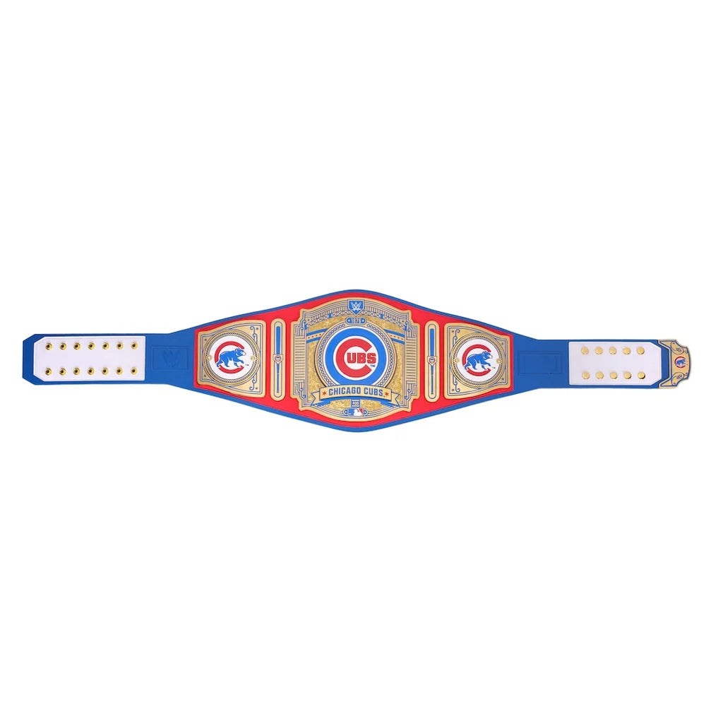 A Chicago Cubs championship belt laid flat against a solid white background. The belt is royal blue with red and gold plates, featuring the Cubs 'C' logo and 'Cubs' branding.