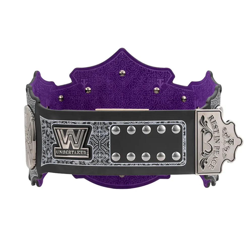 Purple and black wrestling championship belt with silver accents on a white background