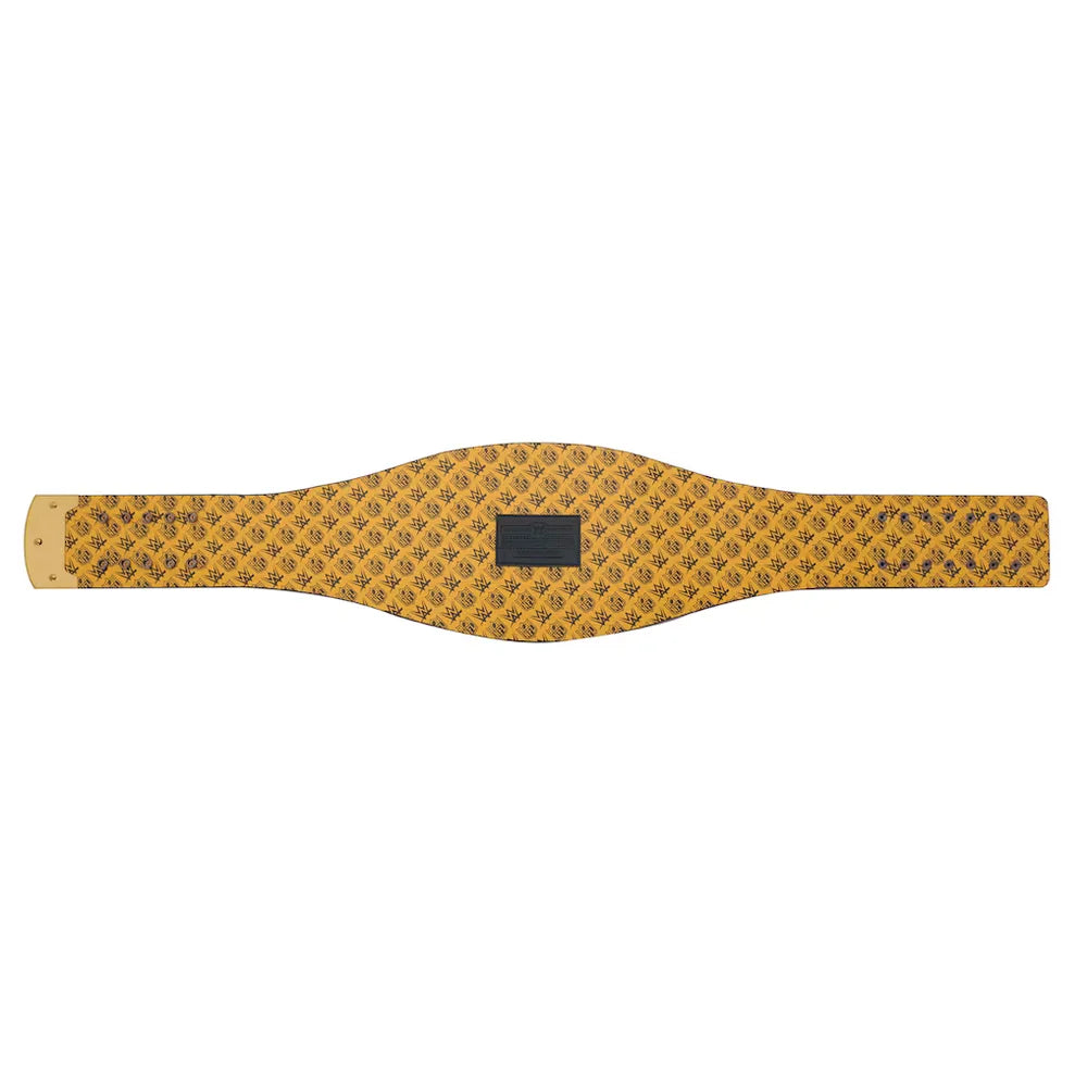 A wide, contoured belt made of textured yellow leather with an all-over black monogram pattern, featuring a central black rectangular patch and a lighter beige leather tip on the left.