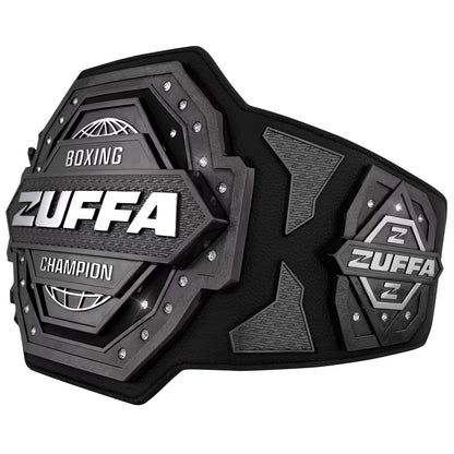 A black and gray Zuffa boxing championship belt with silver lettering and studs, shown on a plain white background.