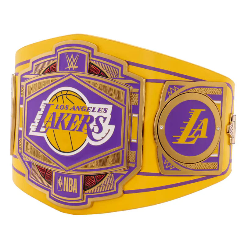 A replica Los Angeles Lakers WWE championship belt featuring a bright yellow strap with purple and gold metal plates, displaying the Lakers logo and WWE branding.
