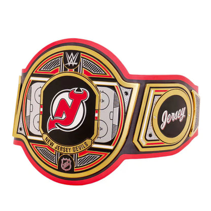 A replica of the WWE New Jersey Devils championship belt, featuring red, black, and gold metallic plates with the team logo and 'Jersey' text, set against a plain white background.