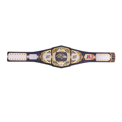 Wrestling championship belt with gold and black design on a white background