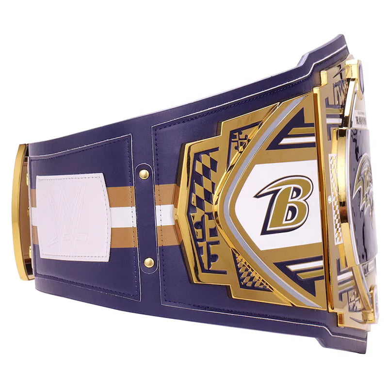 Wrestling championship belt with gold and purple design on a white background