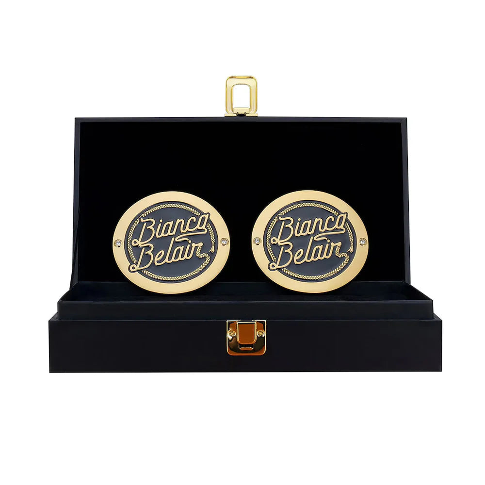 Gold cufflinks with 'Bianco Belair' branding in a black box on a white background Bianca Belair 16MM Replica Side Plate Box Set