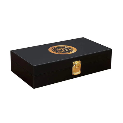 Black jewelry box with gold accents and a visible brand logo on a white background Bianca Belair 16MM Replica Side Plate Box Set