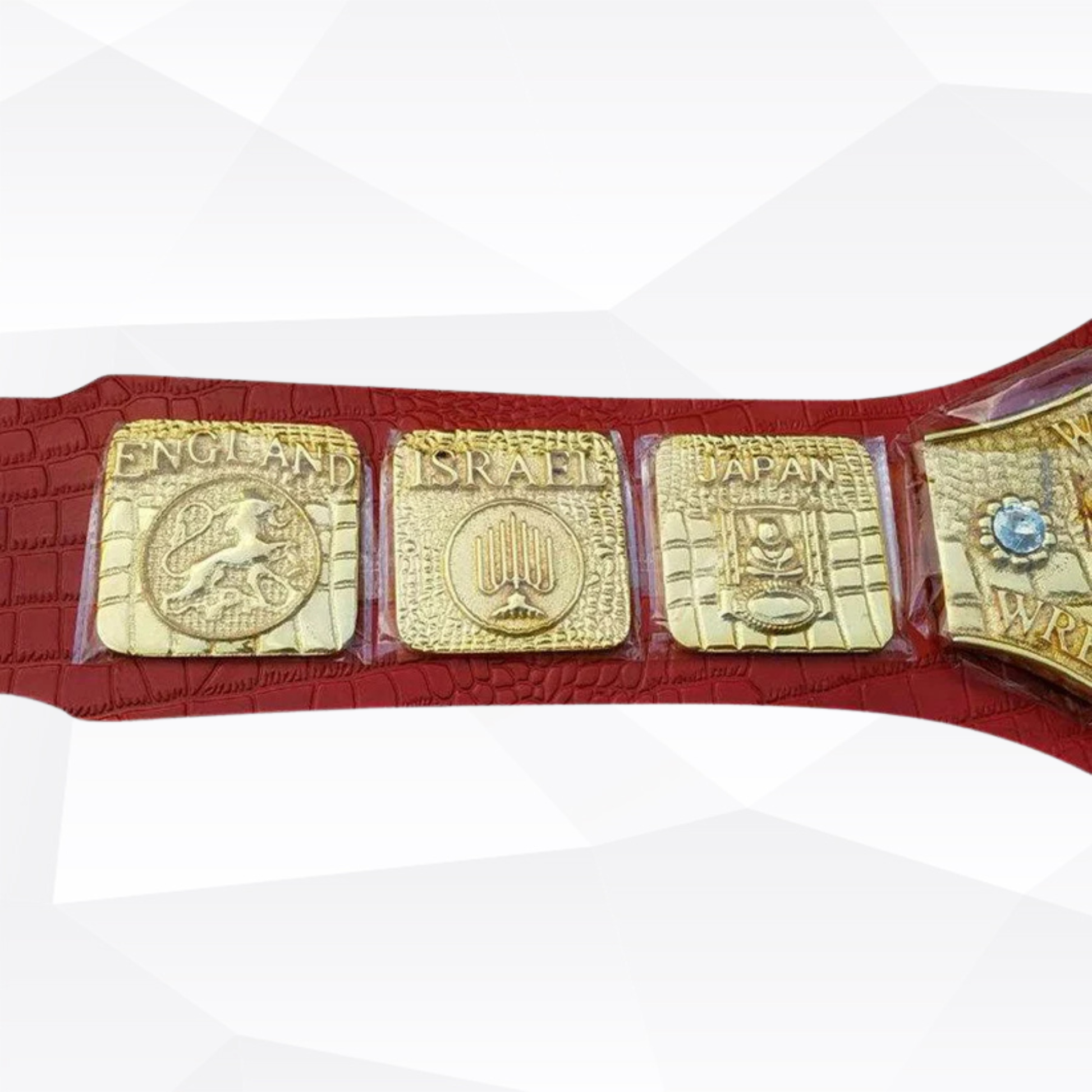 Red championship belt with gold plates on a white background