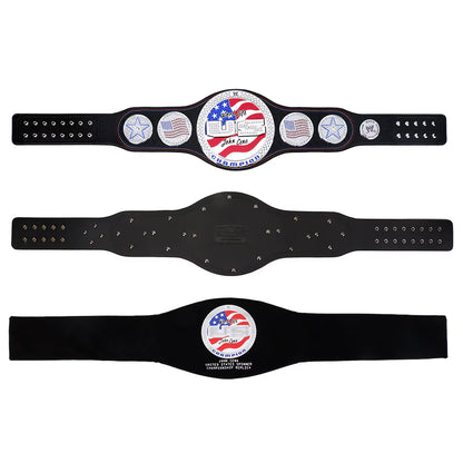 Black championship belt with an American flag emblem on a white background