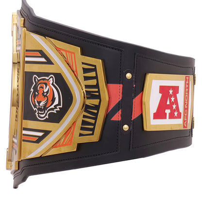 Black championship belt with gold and red accents featuring a tiger logo and letter 'A'.