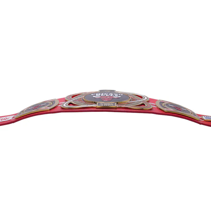 Red championship belt with gold and silver accents on a white background