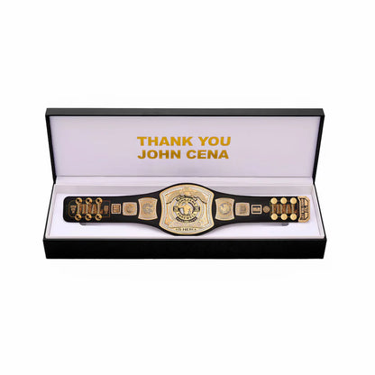 Wrestling championship belt in a display case with 'Thank You John Cena' text.