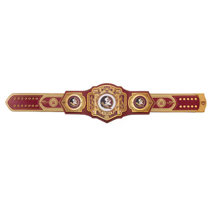 Decorative cigar band with gold and red design on a white background
