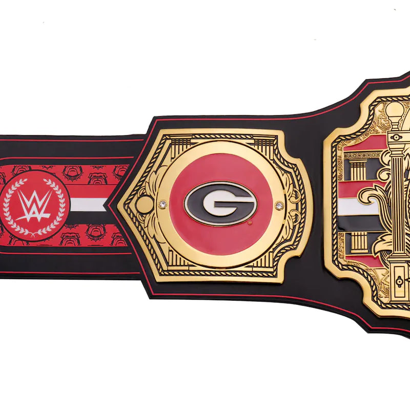 Championship belt with red, black, and gold design on a white background