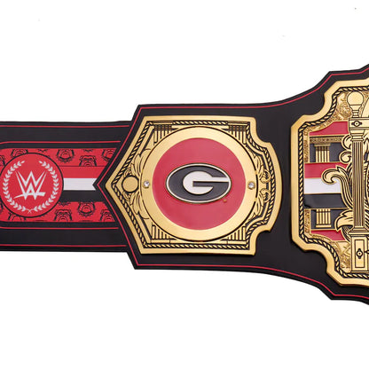 Championship belt with red, black, and gold design on a white background