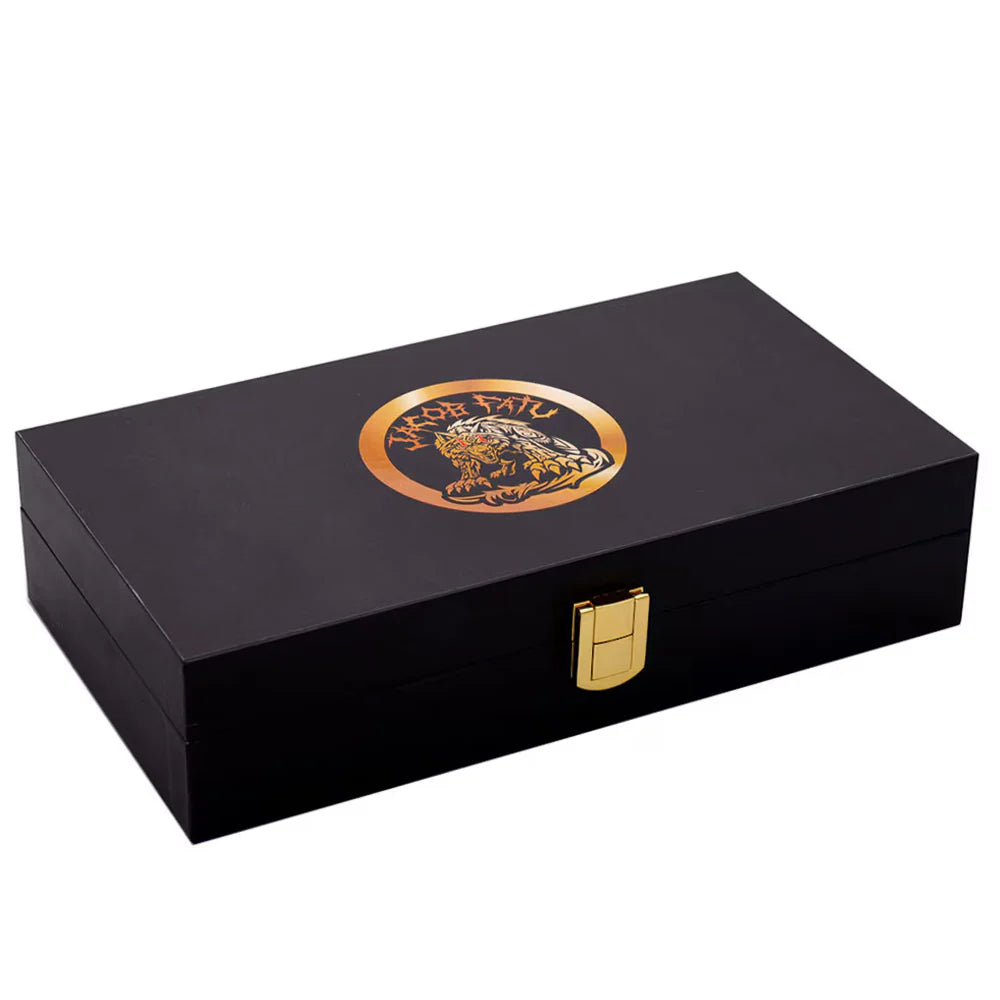 Black wooden box with gold emblem and lock on a white background