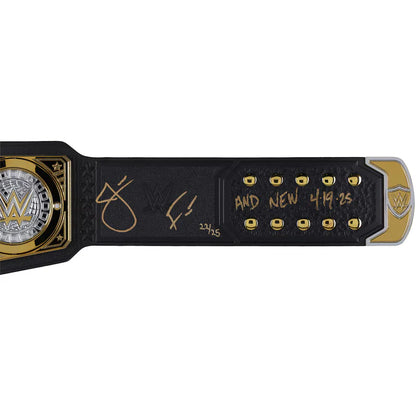WWE championship belt with gold and black design on a white background