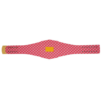 Red belt with a white pattern and yellow label on a white background
