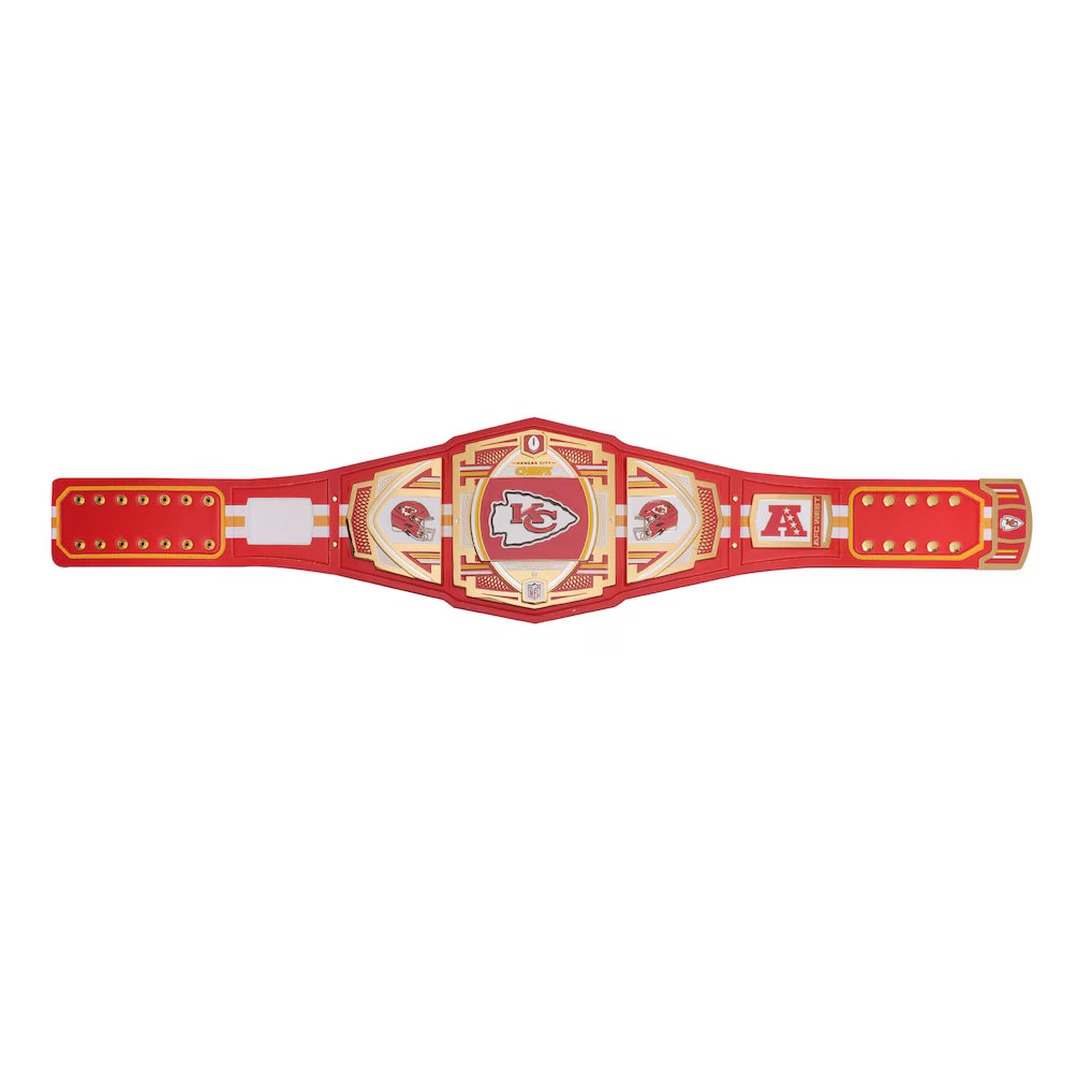 Red and gold championship belt with a logo on a white background