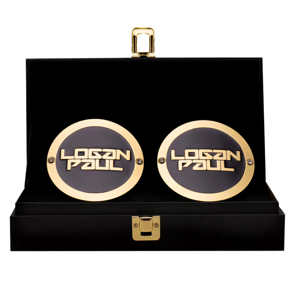 Gold and black 'Logan Paul' cufflinks in a black box with gold accents Logan Paul 16MM Replica Side Plate Box Set