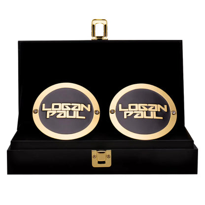 Gold and black 'Logan Paul' cufflinks in a black box with gold accents Logan Paul 16MM Replica Side Plate Box Set