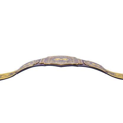 A championship belt with ornate gold and purple detailing, shown curved against a plain white background.