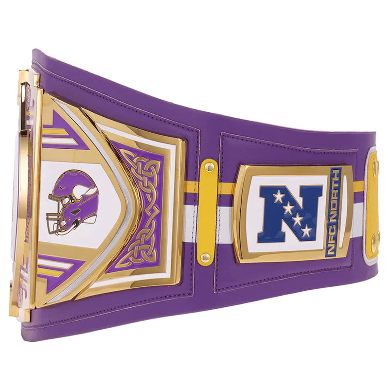 Purple championship belt with gold and white accents featuring a helmet logo and NFC North text.