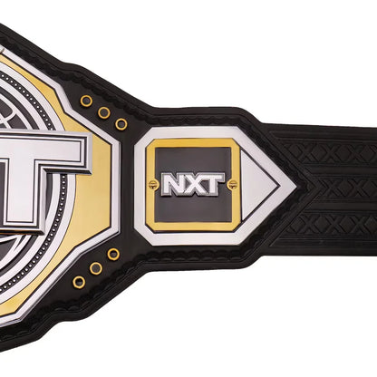 NXT championship belt with black, gold, and white design on a white background