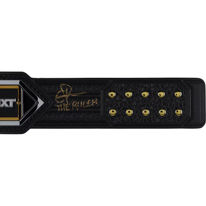 Black championship belt with gold accents and 'The Rukus' branding on a white background