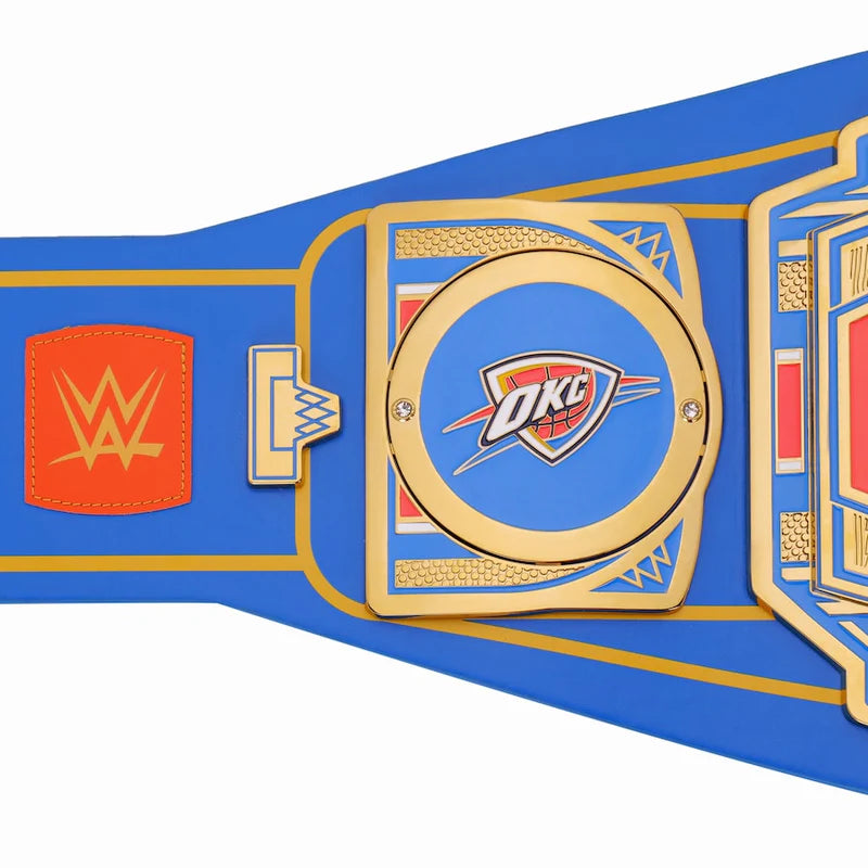 Blue championship belt with WWE and Oklahoma City Thunder logos on a white background